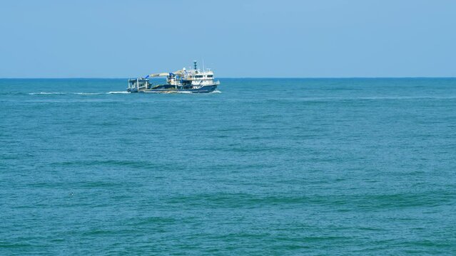 Fishing Ship Trawler At Day In The Sea. Ship Sailing Close Up Fishing Boat. Real time.