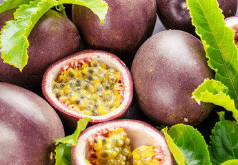 Ripe passion fruits with passion fruit seeds .