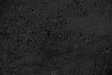 Old black grunge background. Distressed paint texture