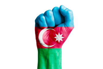 Man hand fist of AZERBAIJAN flag painted. Close-up.