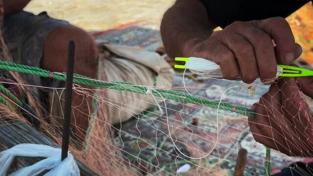 Fisherman Repairs Fishnets Fishing Lines