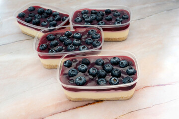 Blueberry cheesecake on a marble table