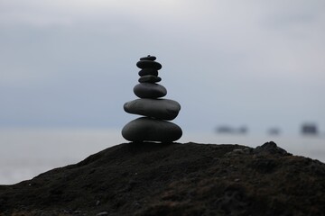 Closeup shot of rock balancing (also stone balancing, or stacking)