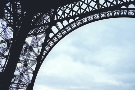Abstract Under the Eiffel Tower in Paris France - Powered by Adobe