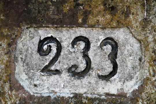 An old kilometer stone on the Old Rhine near Eggenstein in Germany