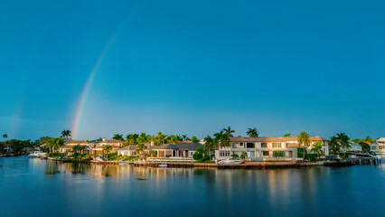 Naklejka na ściany i meble South West Florida Neighbourhood with rainbow and private docks