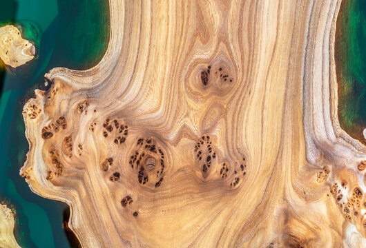 Texture of a wooden table with epoxy resin. Karagach, wood texture