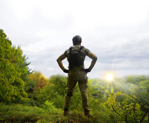 Sad soldier look to the sky