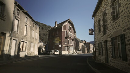 Fototapeta na wymiar Circa January 2022 France - Passenger perspective driving through a French small town