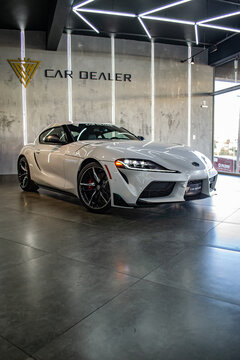 White Toyota Supra Mark V Front View three quarters, car in showroom - High Resolution Image