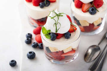 Pound cake and berries layered dessert in a cup, dessert in a glass