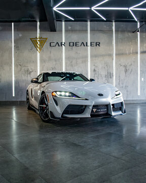 White Toyota Supra Mark V Front View in showroom - High Resolution Image