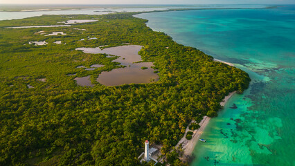 drone fly above natural park biosphere reserve in Tulum Sian Ka'an aerial high angle of punta Allen lighthouse - obrazy, fototapety, plakaty