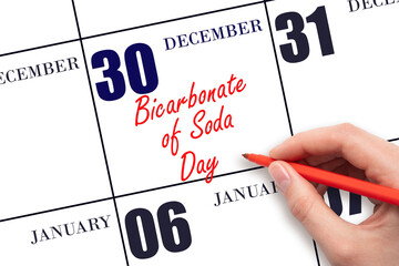 December 30. Hand writing text Bicarbonate of Soda Day on calendar date. Save the date.