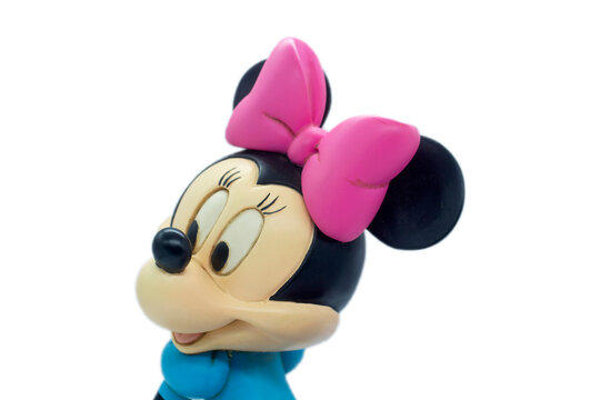 Studio image of a Minnie Mouse resin figure with a white isolated background.