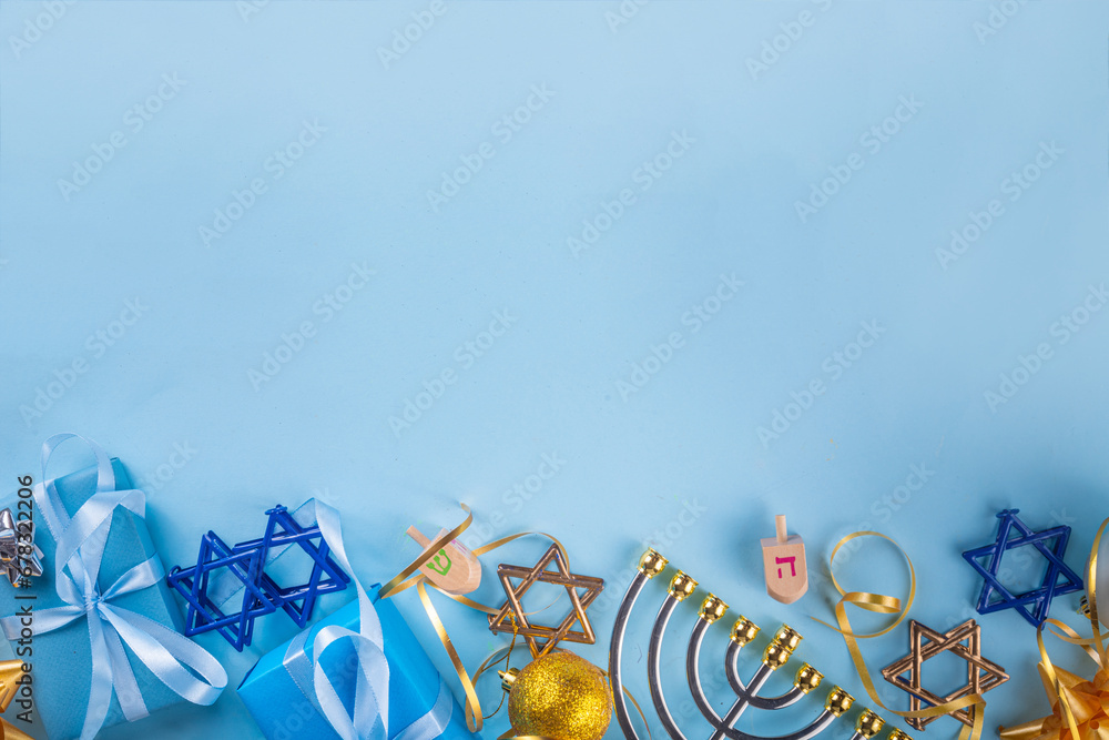 Wall mural Happy Hanukkah greeting card background. Jewish New Year holiday flat lay with traditional symbols of hanukkah festival, menorah, donuts and decorations copy space