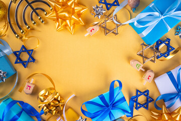 Happy Hanukkah greeting card background. Jewish New Year holiday flat lay with traditional symbols...