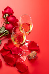 Valentines day card with champagne and rose flowers
