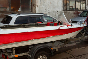 Fototapeta premium Boat on trailer. Boat for swimming. Personal yacht.