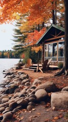 A cabin sits on the shore of a lake