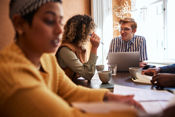 Businessman talking with an office colleague