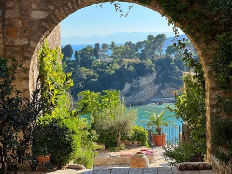 Arch in old town Ulcinj, Montenegro, view on Adriatic sea.