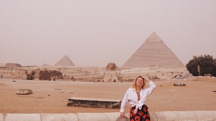 Girl a front of Giza pyramid in Egypt travel photography 