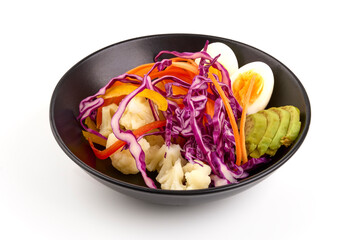 Fresh arugula salad with carrot, eggs, iceberg lettuce, isolated on white background.