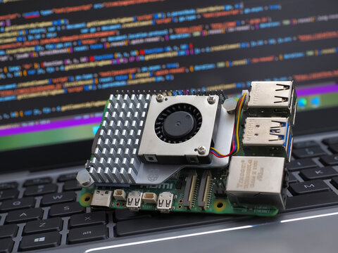 Galati, ROMANIA - November 11, 2023: Close-up of a Raspberry Pi 5 on a laptop keyboard. The Raspberry Pi is a credit-card-sized single-board computer developed in the UK
