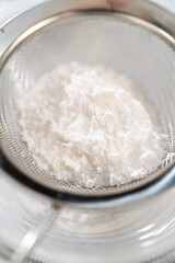 Lemon blueberry bundt cake with powdered sugar dusting