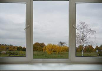 Window frame, view from the window, landscape outside.