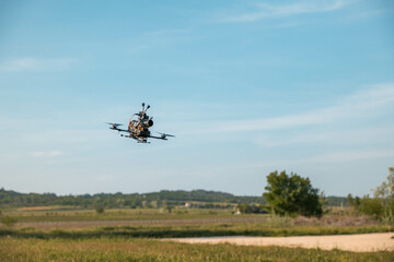 Fototapeta na wymiar Cinematic UAV soaring for aerial shots in daylight.