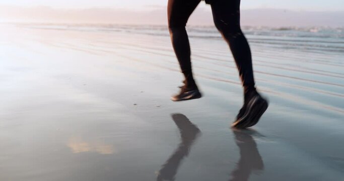 Fitness, beach or legs of runner on sand in cardio workout or exercise with speed training in Miami. Footwear, fast running or closeup of sports athlete sprinting or jogging at sunset in nature