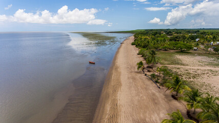 Gentle waves kiss Awala-Yalimapo's sandy beach