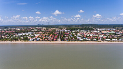 Aerial perspective of Kourou's coastal edge.