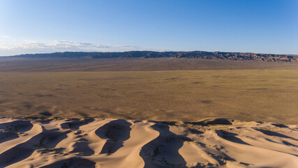 Fototapeta na wymiar The Gobi's vast dune field, crisp in morning light.