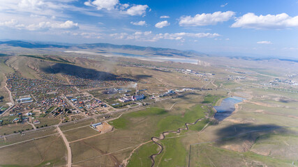 Industrial beauty terraced mine in Mongolian plains mining village aerial
