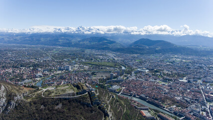 Grenoble from above fortress overseeing the city sunny day aerial