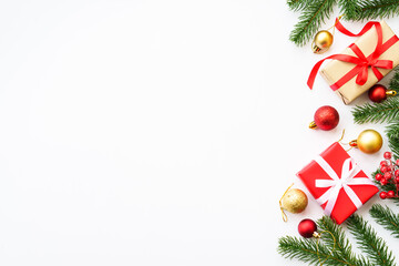 Fototapeta na wymiar Christmas Present box, fir tree and decorations at white backgrouns.