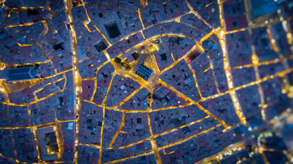 Aerial top shot over maze ecusson historic city center 