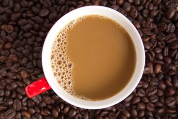 cup of coffee with beans