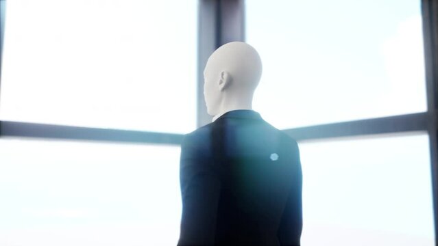 A robot humanoid staying in the empty office and looking out the window at the big city. future technology concept
