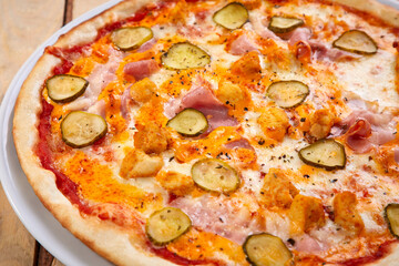 tasty pizza on the wooden board