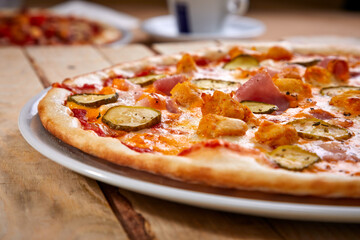 tasty pizza on the wooden board
