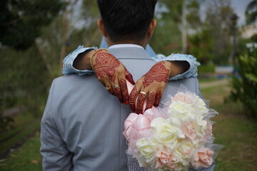 bride and groom with bouquet