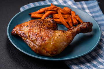 Delicious grilled chicken leg or quarter with salt and spices