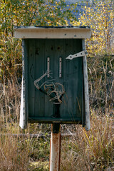 Signaling box of former Valdresbanen Railroad crossing by Fall in Søndre Land, Norway.