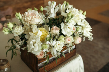 Beautiful bouquet of flowers in a vintage wooden gift box.