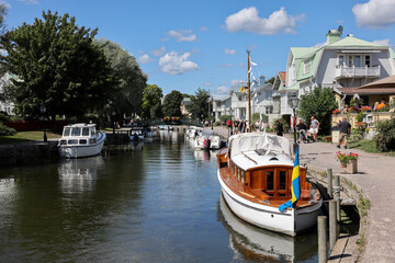 View of the Trosa river with moored pleasure boats  in the picturesque seaside town of Trosa in...