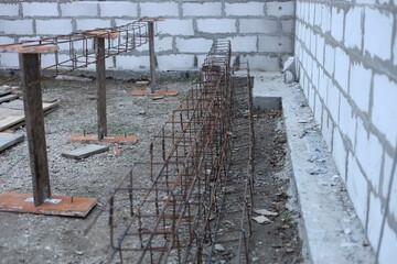 metal frames made of reinforcement at a construction site